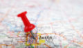 Picture of a map with a pinpoint on Austin, Texas.