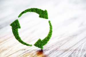 Sustainable development concept. 3D illustration on wooden background.