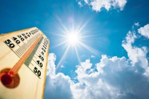 Thermometer Sun high Degres. Hot summer day. High Summer temperatures