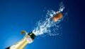 Photo of champagne popping.