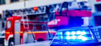 Photo of police car and fire truck.