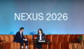 Photo of CalPERS CEO Marcie Frost speaking with Chris Witkowsky of PEI Group at NEXUS 2026.