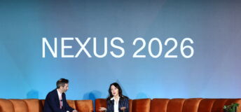 Photo of CalPERS CEO Marcie Frost speaking with Chris Witkowsky of PEI Group at NEXUS 2026.