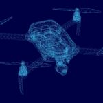 A 3D wireframe model of a quadcopter drone.