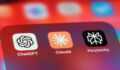 Photo illustrating AI concept with images of Claude and ChatGPT icons.