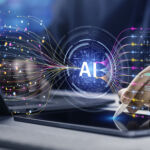 Image of a digital AI button hovering over a laptop, symbolizing the synthesis of data.